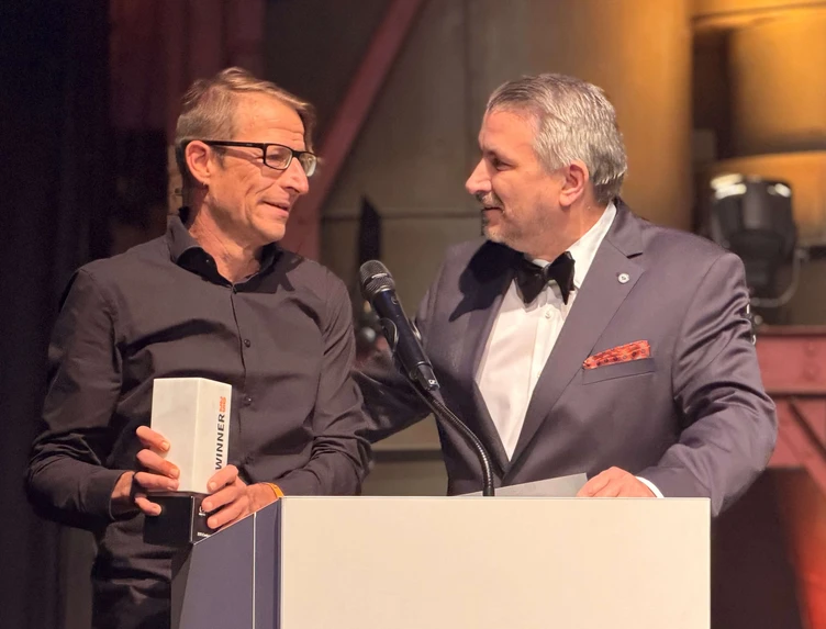 Achim winning the Award "Best TYPO3 Extension" in 2025