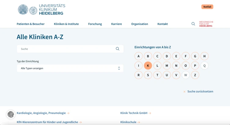 Heidelberg University Hospital website displaying a directory of clinics organized alphabetically, with search functionality and categories listed.