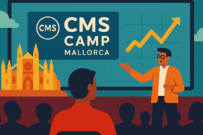 A presenter in an orange jacket gestures towards a screen displaying "CMS Camp Mallorca" and a rising graph, while an audience watches. A stylized castle is visible on the left side of the scene.