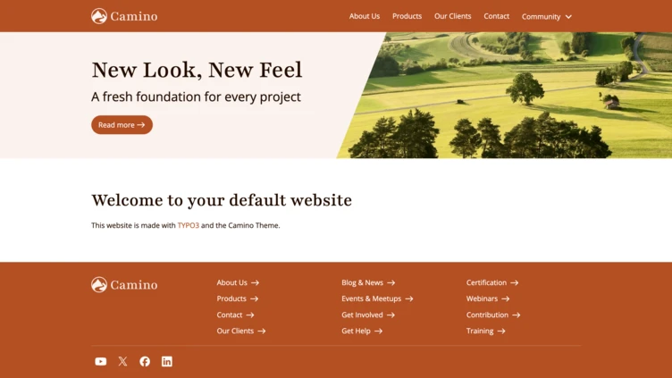 Website homepage featuring a banner with the text "New Look, New Feel" and a welcome message, along with navigation links at the bottom.