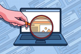 A hand holding a magnifying glass over a laptop screen displaying a webpage with an image and text elements.