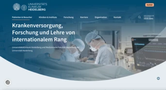 Surgeons and medical staff in a hospital setting, engaged in a procedure, with medical equipment visible in the background.